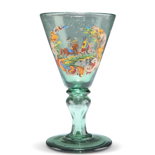 23 - A 19TH CENTURY BOHEMIAN GREEN GLASS WINE, the funnel bowl decorated in enamels with a Historismus hu... 