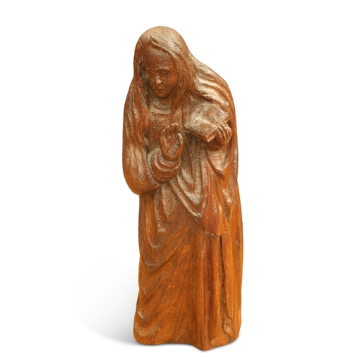 284 - A 19TH CENTURY OAK CARVING OF A SAINT. 40.5cm high