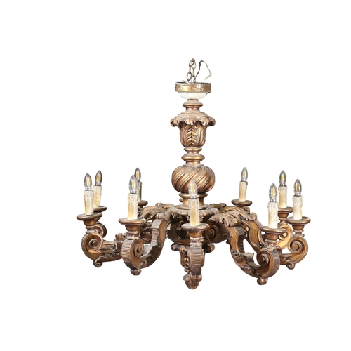 294 - A LARGE BAROQUE STYLE GILTWOOD CHANDELIER, probably 19th Century, the ten leaf-capped branches with ... 