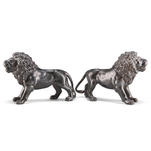 40 - A PAIR OF 19TH CENTURY PATINATED METAL LIONS, in standing pose with open mouths. (2) 14cm by 20cm... 