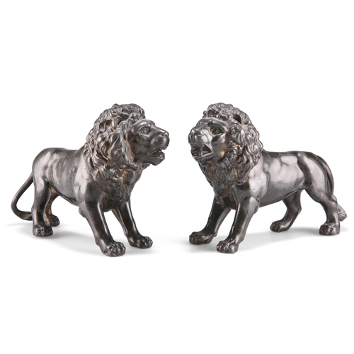 40 - A PAIR OF 19TH CENTURY PATINATED METAL LIONS, in standing pose with open mouths. (2) 14cm by 20cm... 