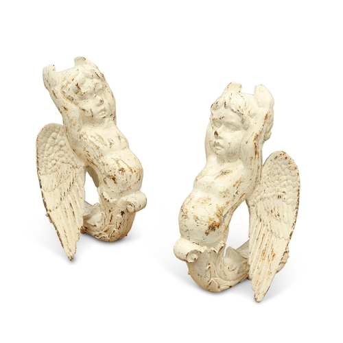 43 - A PAIR OF PAINTED CAST IRON WINGED CHERUBS, of scroll form. 43cm high