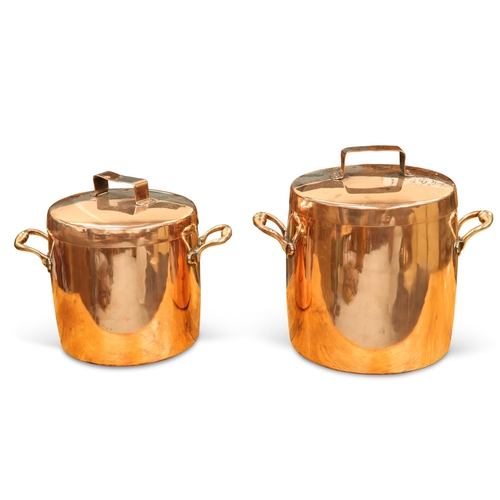 50 - TWO COPPER TWO-HANDLED COVERED PANS, each cylindrical. (2) Larger 34cm high, approx. 36cm across han... 