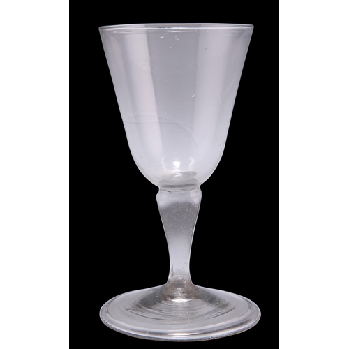 6 - A SILESIAN STEM WINE GLASS, CIRCA 1760, with bucket bowl, of grey metal, on a folded foot. 11.5cm hi... 