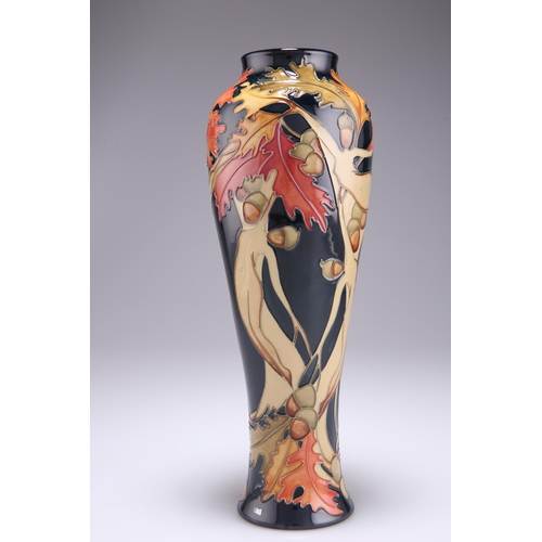 80 - A MOORCROFT LIMITED EDITION WOOD NYMPH PATTERN TUBE LINED POTTERY VASE, 117/150, designed by Kerry G... 