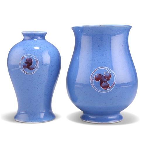 83 - TWO WILLIAM MOORCROFT BURSLEM FLAMMINIAN WARE VASES, of baluster form, in speckled powder blue glaze... 