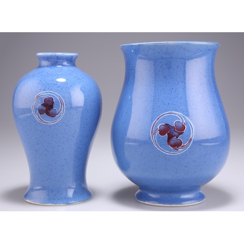 83 - TWO WILLIAM MOORCROFT BURSLEM FLAMMINIAN WARE VASES, of baluster form, in speckled powder blue glaze... 