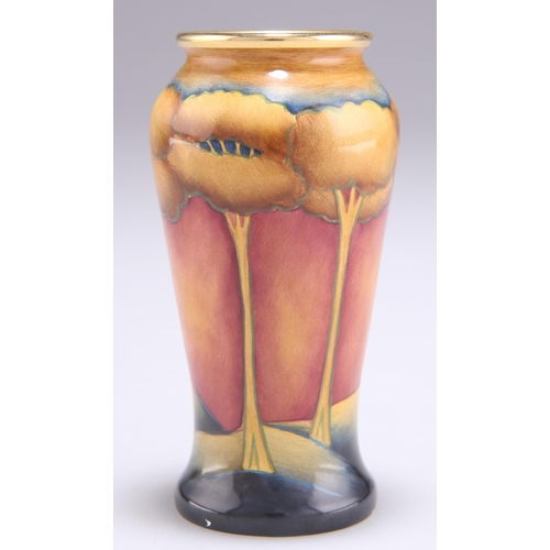 87 - A MINIATURE MOORCROFT EVENTIDE PATTERN VASE, tall baluster form with a gilt rim, printed marks and d... 