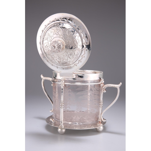 1003 - A LATE VICTORIAN SILVER-PLATED AND GLASS BISCUIT BOX the circular barrel with a hinged domed cover, ... 