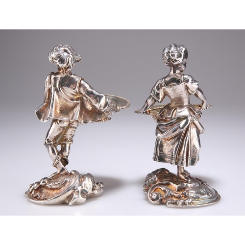 1007 - A PAIR OF 19TH CENTURY CONTINENTAL SILVER-PLATED FIGURAL SALTS the figures modelled in 18th Century ... 