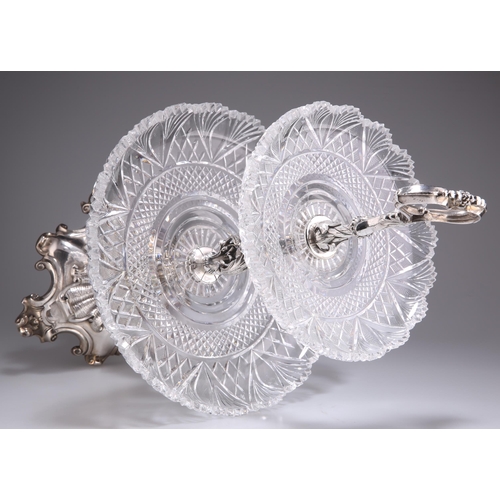 1009 - A VICTORIAN SILVER-PLATED AND CUT-GLASS CENTREPIECE by Elkington & Co, with two circular graduat... 