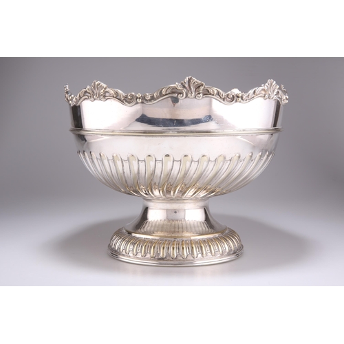 1010 - A LATE 19TH CENTURY LARGE SILVER-PLATED BOWL by W. Briggs & Co, Sheffield, with scroll-cast rim,... 