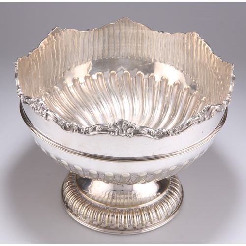 1010 - A LATE 19TH CENTURY LARGE SILVER-PLATED BOWL by W. Briggs & Co, Sheffield, with scroll-cast rim,... 