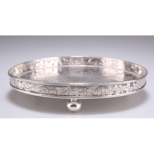 1033 - A CHINESE SILVER TRAY by Wang Hing & Company, late 19th Century, circular with pierced gallery, ... 