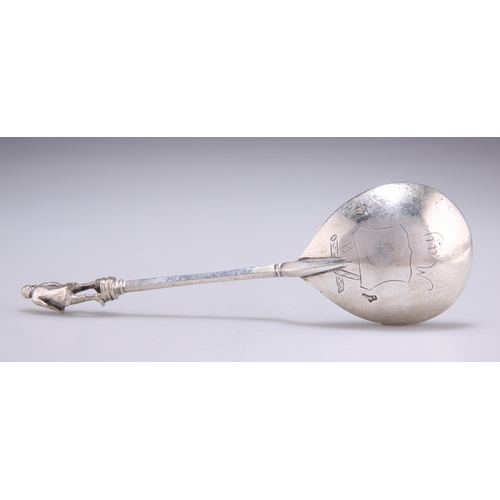 1048 - A CONTINENTAL SILVER SPOON indistinct marks, with a fig-shaped bowl and figural terminal. 17cm long,... 