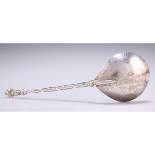 1059 - A CONTINENTAL SILVER SPOON marks indistinct, with a fig-shaped bowl and figural terminal. 17.5cm lon... 