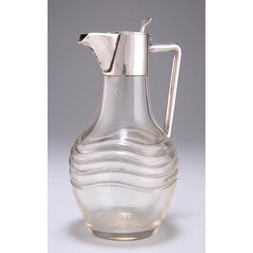 1063 - AN AUSTRO-HUNGARIAN SILVER-MOUNTED GLASS CLARET JUG Vienna, late 19th/early 20th Century, with tubul... 