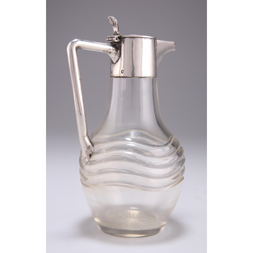 1063 - AN AUSTRO-HUNGARIAN SILVER-MOUNTED GLASS CLARET JUG Vienna, late 19th/early 20th Century, with tubul... 