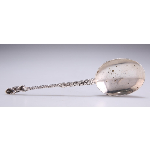 1071 - A CONTINENTAL SILVER SPOON indistinct marks, with an oval bowl and figural terminal to the twisted s... 