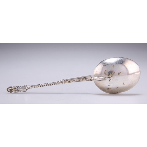 1071 - A CONTINENTAL SILVER SPOON indistinct marks, with an oval bowl and figural terminal to the twisted s... 