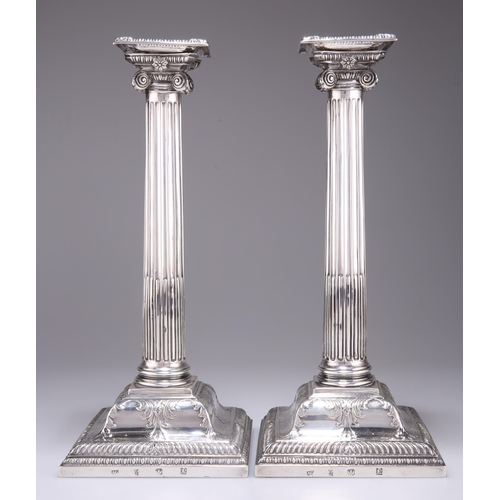 1084 - A PAIR OF GEORGE III SCOTTISH SILVER CANDLESTICKS by Alexander Gardner, Edinburgh 1767, the stop-flu... 