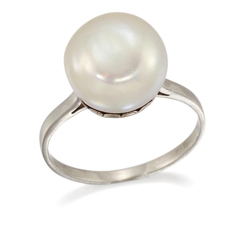 1795 - A CULTURED BUTTON PEARL RING Ring size L1/2, 4.1 gramsThe pearl is of pink-green lustre with a sligh... 