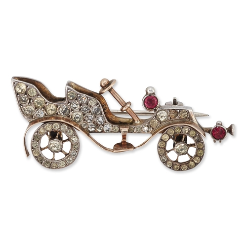 1797 - AN EARLY 20TH CENTURY NOVELTY PASTE AUTOMOBILE BROOCH set throughout with white and red paste. Marke... 