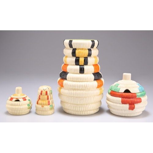 117 - A GROUP OF CLARICE CLIFF BIZARRE RAFFIA CERAMICS comprising A 722 SHAPE VASE, 15.5cm high; A PRESERV... 