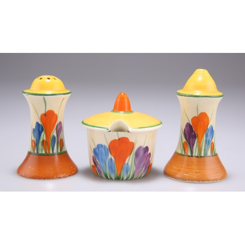 120 - A CLARICE CLIFF BIZARRE CROCUS PATTERN THREE-PIECE CONDIMENT SET Newport pottery backstamps. (3) 8.5... 