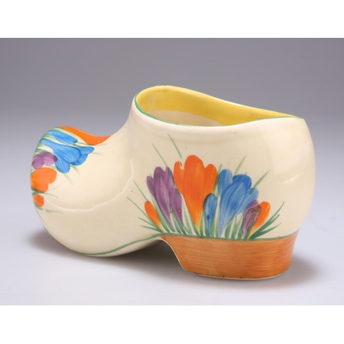 128 - A CLARICE CLIFF BIZARRE CROCUS PATTERN SABOT CLOG Newport pottery backstamp. 7cm highSome losses to ... 