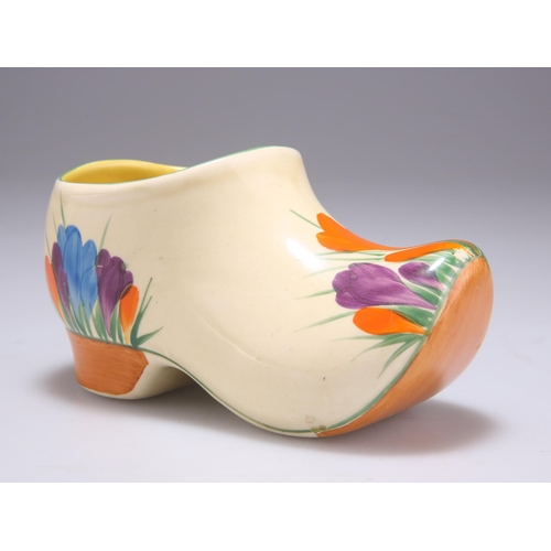 128 - A CLARICE CLIFF BIZARRE CROCUS PATTERN SABOT CLOG Newport pottery backstamp. 7cm highSome losses to ... 