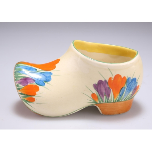 128 - A CLARICE CLIFF BIZARRE CROCUS PATTERN SABOT CLOG Newport pottery backstamp. 7cm highSome losses to ... 