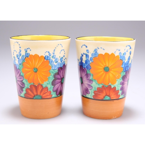 148 - A PAIR OF CLARICE CLIFF BIZARRE GAYDAY PATTERN BEAKERS Newport pottery backstamps. (2) 9.5cm highBot... 