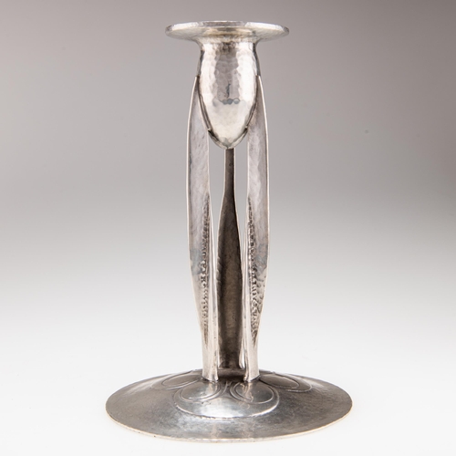 71 - ARCHIBALD KNOX (1864-1933) FOR LIBERTY & CO, A TUDRIC PEWTER CANDLESTICK no. 0223, the bullet-shaped... 