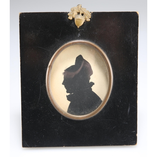 2106 - 19TH CENTURY ENGLISH SCHOOL PORTRAIT SILHOUETTE OF A LADY Watercolour
 (7.5cm x 6cm)... 