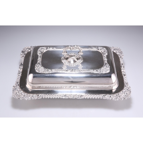 1007 - A PAIR OF SILVER-PLATED ENTRÉE DISHES by Baker Brothers, rounded rectangular, with gadrooned and fol... 