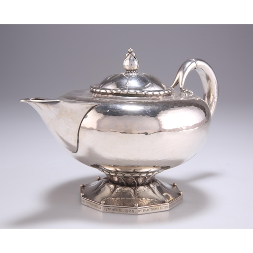 1038 - GEORG JENSEN: A DANISH STERLING SILVER THREE-PIECE TEA SERVICE, CIRCA 1915-1930 by Georg Jensen, imp... 