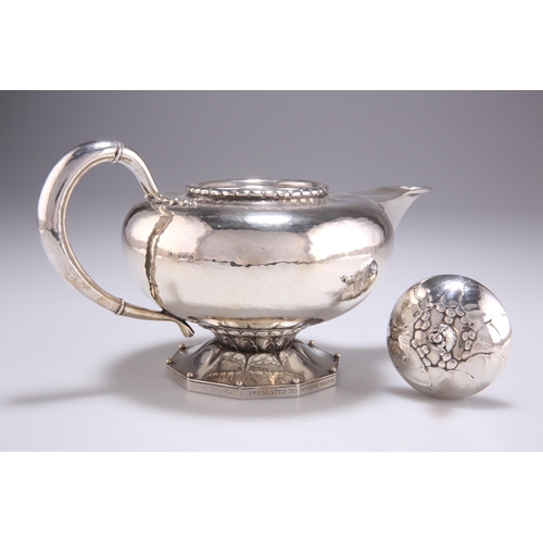 1038 - GEORG JENSEN: A DANISH STERLING SILVER THREE-PIECE TEA SERVICE, CIRCA 1915-1930 by Georg Jensen, imp... 