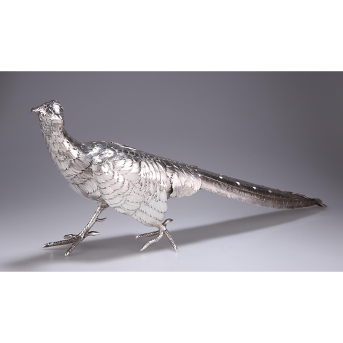 1059 - A LARGE GERMAN SILVER PHEASANT TABLE ORNAMENT c.1900, naturalistically modelled, with hinged wings a... 