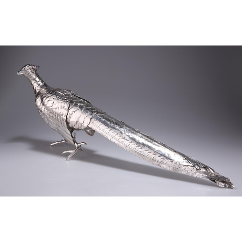 1059 - A LARGE GERMAN SILVER PHEASANT TABLE ORNAMENT c.1900, naturalistically modelled, with hinged wings a... 