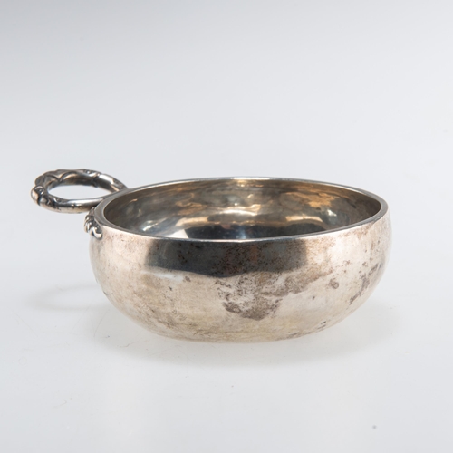 1061 - A 19TH CENTURY FRENCH SILVER TASTE-VIN indistinct marks, circular, conjoined serpent handle. 10.5cm ... 