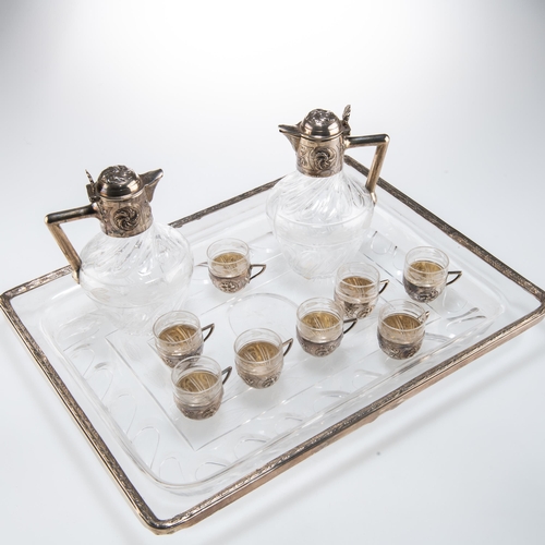 1065 - A FINE FRENCH SILVER-MOUNTED DRINKS SET late 19th/early 20th Century, the rectangular cut-glass tray... 