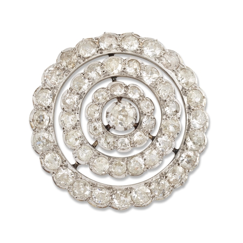 1691 - AN EARLY 20TH CENTURY DIAMOND BROOCH / PENDANT an old-cut diamond within a concentric circular borde... 