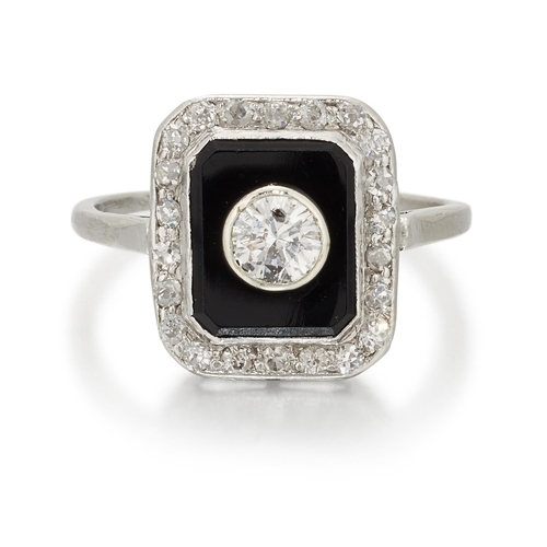 1694 - AN ART DECO ONYX AND DIAMOND CLUSTER RING an old-cut diamond within an onyx plaque and a milgrain bo... 