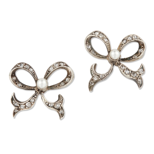 1697 - A PAIR OF SEED PEARL AND DIAMOND STUD EARRINGS ribbon bows set with rose-cut diamonds and seed pearl... 