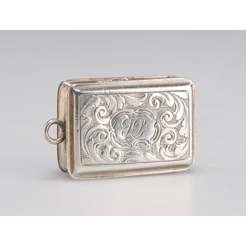 1056 - AN EARLY VICTORIAN SILVER VINAIGRETTE by Nathaniel Mills, Birmingham 1843, rectangular, with scrolle... 