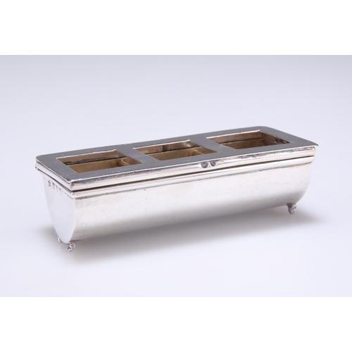 1397 - A VICTORIAN SILVER STAMP BOX by Lawrence Emanuel, Birmingham 1898, the demilune trough with two divi... 