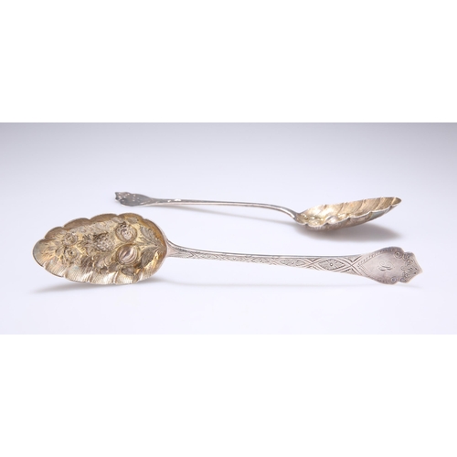 1400 - A PAIR OF GEORGE IV SILVER BERRY SPOONS by William Woodman, Exeter 1829, with monogrammed shield-sha... 