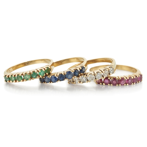 2073 - AN EMERALD, DIAMOND, RUBY AND SAPPHIRE FOUR RING SET each half hoop ring set with round-cut stones. ... 