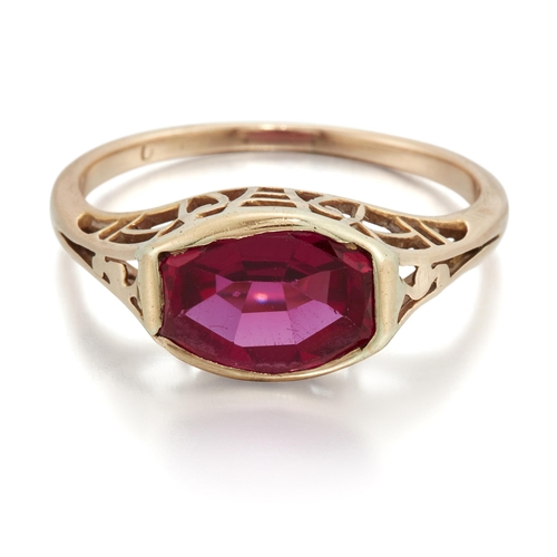 2480 - AN ART DECO SYNTHETIC RUBY RING an octagonal-cut synthetic ruby in a bezel setting, to fancy pierced... 